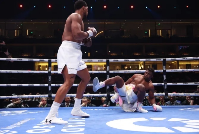 Boxing: Anthony Joshua brutally knocks out Francis Ngannou in two rounds in heavyweight clash